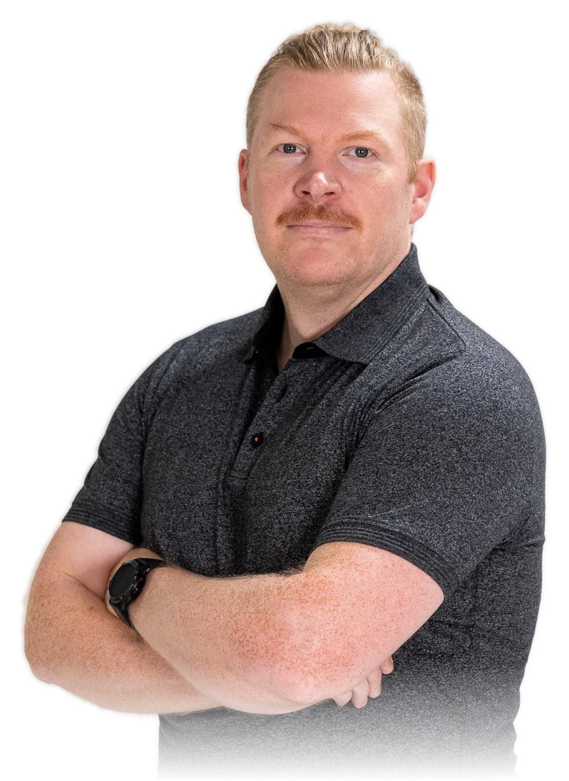 Petri Korhonen, founder of Sunrise Software, arms folded, in a dark polo shirt